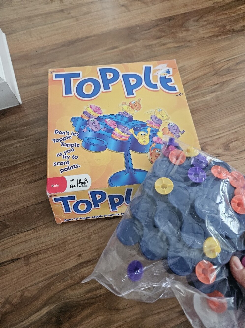 Topple Game by Milton Bradley - Multicolor